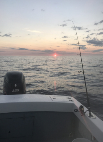 Sunrise from the stern of the Ali J II, charter fishing boat